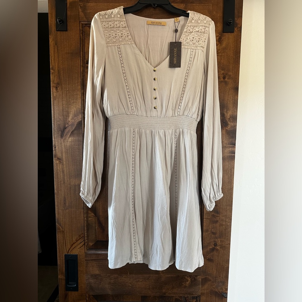 Shyanne Tan Long Sleeve V-Neck dress.